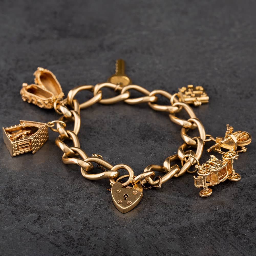 Pre-Owned 9ct Yellow Gold With Assorted Charms Vintage 7.25 Inch Charm Bracelet 4123013