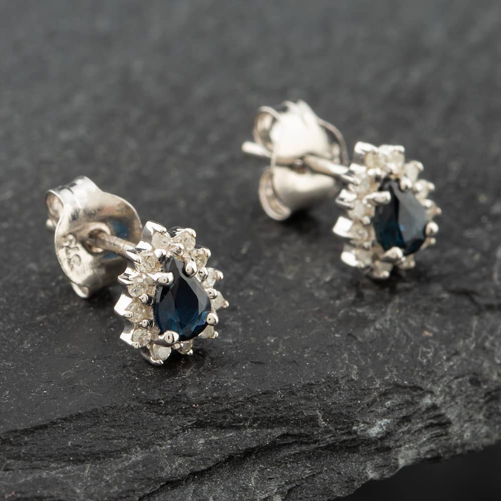 Pre-Owned White Gold 0.38ct Pear Cut Sapphire & 0.09ct Brilliant Cut Diamond Cluster Stud Earrings 43171094