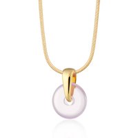 Gold Plated Red Spinning Disc Necklace