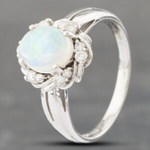 Pre-Owned Platinum Certificated 0.95ct Opal & 0.21ct Brilliant Cut Diamond Oval Cluster Ring 43381011