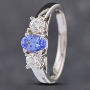 Pre-Owned 14ct White Gold Oval Cut Tanzanite & 0.40ct Brilliant Cut Diamond Three Stone Ring 43411020
