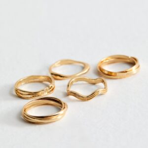 Pack of five Gold Tone Crossover Rings New Glance