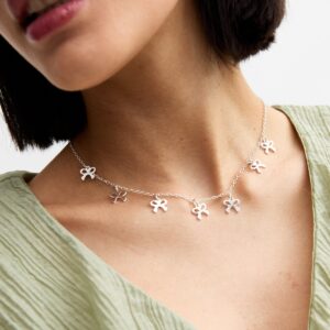 Silver Tone Bow Attraction Necklace New Glance