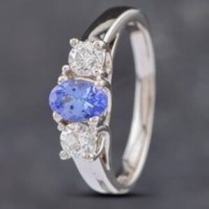 Pre-Owned 14ct White Gold Oval Cut Tanzanite & 0.40ct Brilliant Cut Diamond Three Stone Ring 43411020