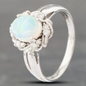 Pre-Owned Platinum Certificated 0.95ct Opal & 0.21ct Brilliant Cut Diamond Oval Cluster Ring 43381011