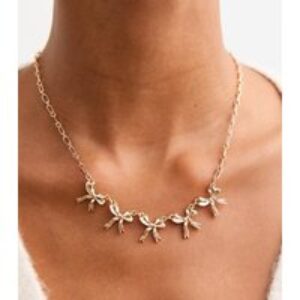 Gold Tone Bow Appeal Necklace New Glance