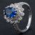 Pre-Owned 14ct White Gold Oval 2.36ct Sapphire & 0.70ct Diamond Cluster Ring 4336144